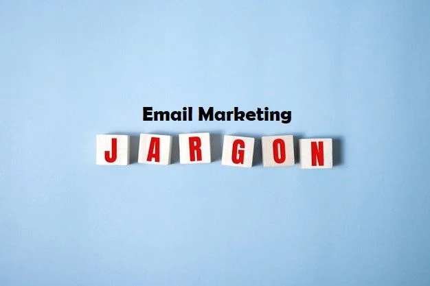 The word "JARGON" is spelled out using white Scrabble tiles with red lettering on a light blue background, accompanied by the text "Email Marketing" above.